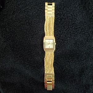 Chico's gold watch